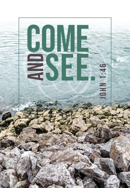 A rocky shore with water and text
AI-generated content may be incorrect.